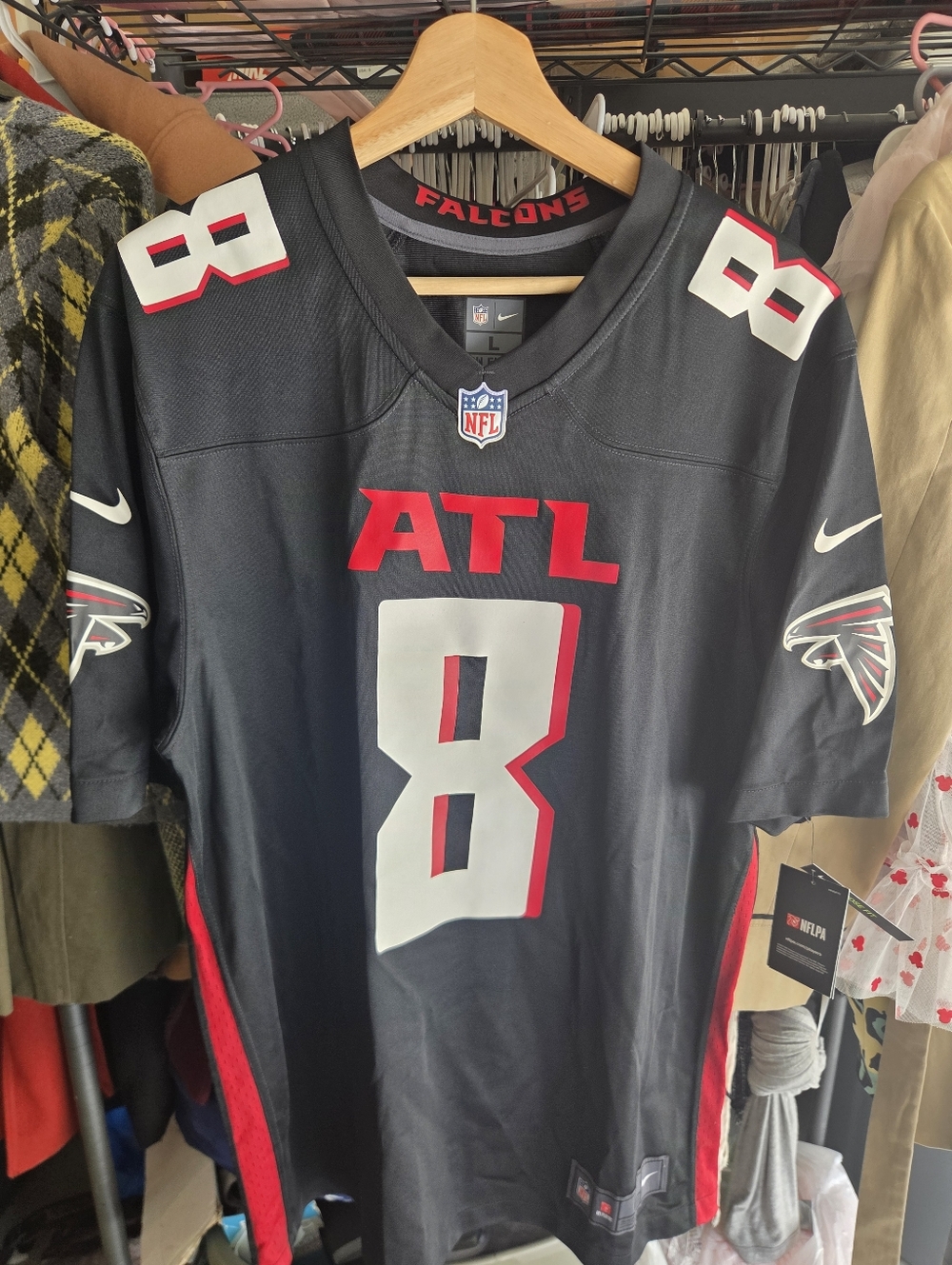 NFL Black Jersey with Red ATL Block Letters and NFL Shield